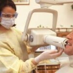 Walls Family Dentistry Dental Assistant taking XRay